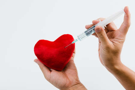Vaccination to the red heartの写真素材