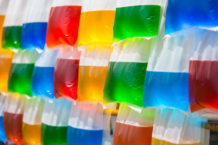 Background from color water in plastic bag, water with various color in plastic bag hanging,color,background,recycle, plastic, miraculous, water, store,water colors,,Water colors inside a plastic bagの写真素材