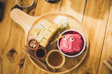 honey toast and Ice cream strawberry in restaurant