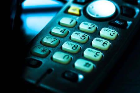 Telephone keypad with buttons. Close up photo of dial phone keyboard number button.