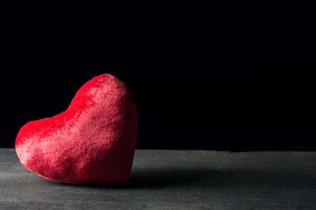 Read Heart on wooden table, Valentine concept, Still life.の写真素材