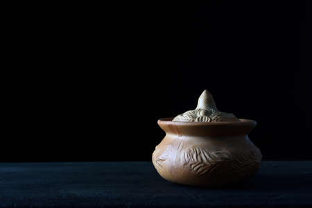 Pottery pots placed on a dark background.の写真素材