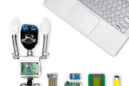 Close-up of DIY robot and microcontrollers board in robotics laboratory school.
