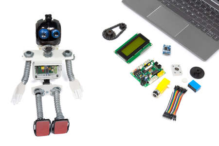Close-up of DIY robot and microcontrollers board in robotics laboratory school.