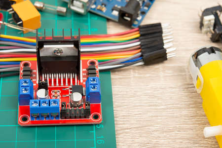 Education circuit and motor activity. Science, Technology, Engineering and Mathematics (STEM) education concept. frame collage with copy space of microcontroller board.の写真素材