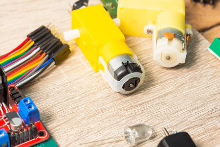 Education circuit and motor activity. Science, Technology, Engineering and Mathematics (STEM) education concept. frame collage with copy space of microcontroller board.の写真素材