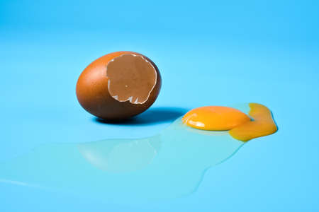 Fresh eggs in a sack bag on blue background.の写真素材