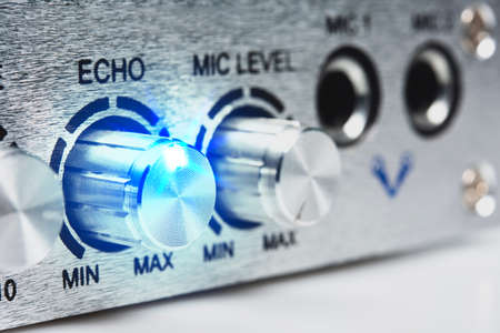 Stereo audio amplifier. Detail of sound volume controls.