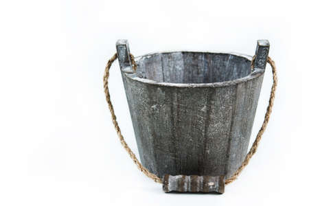 gray wooden bucket isolated on white.の写真素材