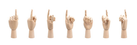 wooden hands of mannequins showing different gestures on white background.の写真素材