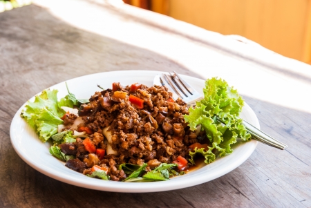 Fried noodles with minced pork and herb, called Kuay-Teow-Bog, is one of delicious Thai dish の写真素材