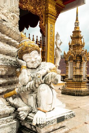 White statue with golden headdress