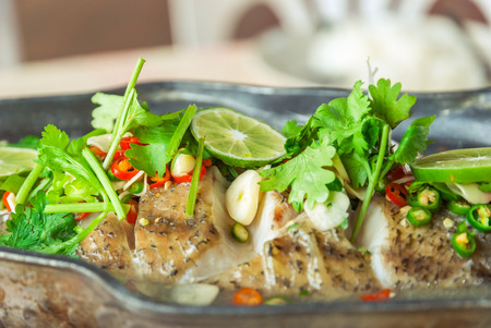 Famous Thai cuisine, Close-up steamed seabass in lime sauceの写真素材