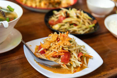 Som tam thai, spicy papaya salad with dried shrimp and nut. one of famous thai food.の写真素材