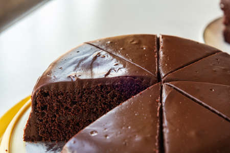 Homemade round chocolate cake with chocolate frosting.の写真素材