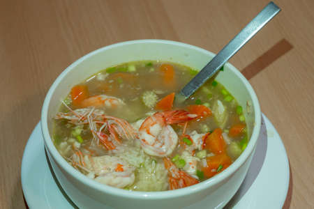 soft boiled rice with shrimp and vegetables.の写真素材