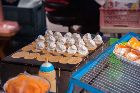 Thai Crispy Pancake with  fresh cream and Gold Egg Yolk Thread toppingの写真素材