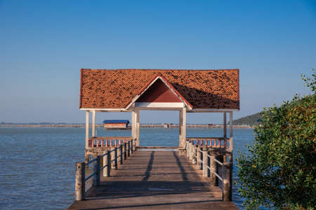 Waterfront pavilion with blue sky. Evening of southern Thailand.の写真素材
