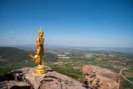 golden buddha image on the hill with clear sky  background in Lopburi province, Thailandの写真素材