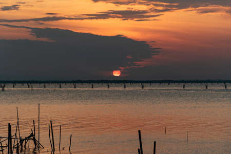 beauty sunset view in a cloudy day. At Koh yor, Songkla province, Thailand.の写真素材