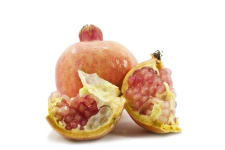 juicy pomegranate on white background