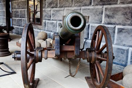 old cannon and cannonballsのeditorial素材