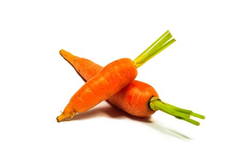 Baby carrots on white backgroundの写真素材