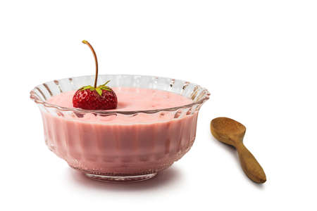 Yogurt with strawberry on white の写真素材