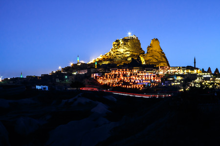 Uchisar and the village in the night, cappadocia, turkeyの写真素材