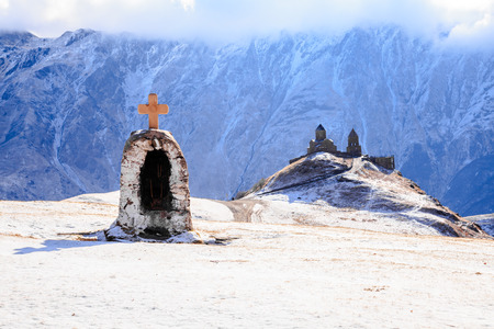 Gergeti Sameba Church is on the mt. kazbek near the town of Stepantsminda in Georgiaの写真素材
