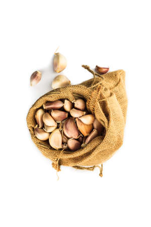 High angle view of garlic in a ramie sacの写真素材