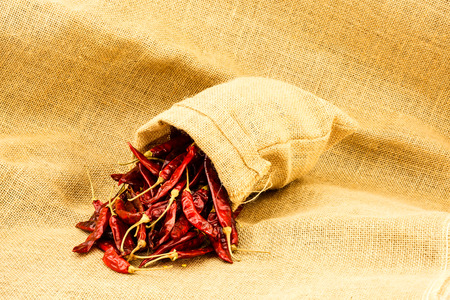 Dry red chili in a ramie sacの写真素材