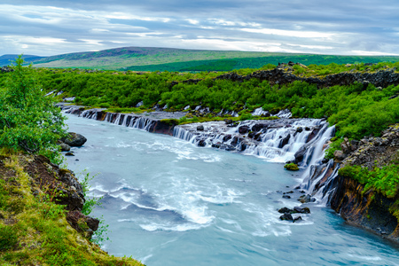 Hraunfossar or Lava Falls is a beautiful waterfalls in the West Iceland.の写真素材