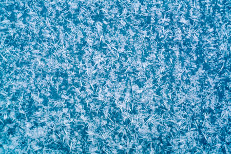Snow crystals on the ice floor at Lake Baikal in Russiaの写真素材