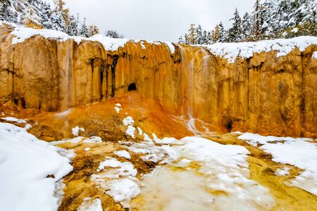 Frozen waterfalls and snow in Huanglong Scenic Area, Sichuan, Chinaの写真素材
