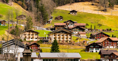 Panoramic view of a village at the valley of the Alps mountain in Switzerlandの写真素材