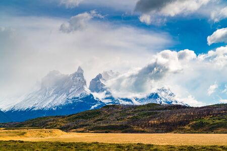 Landscape with snow capped Cuernos Del Paine mountain at Torres del Paine National Park in Southern Chilean Patagonia, Chileの写真素材