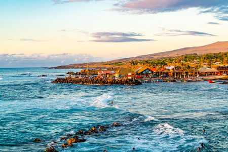 EASTER ISLAND, CHILE - FEBRUARY 11, 2016 : View of fisherman port of Hanga Roa Village on Rapa Nui or Easter Island in Chile in the eveningのeditorial素材