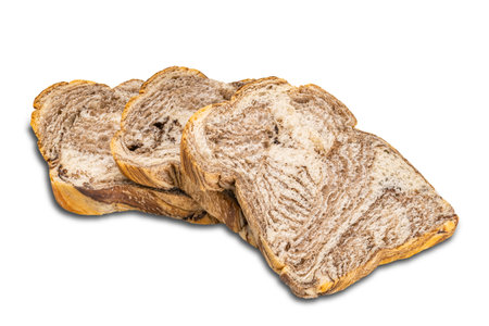 Slice of fresh organic striped chocolate danish bread isolated on white background with clipping path.の写真素材