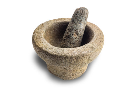 High angle view of empty rock mortar with pestle isolated on white background with clipping path.の写真素材