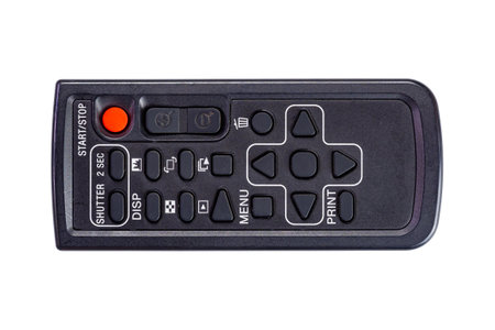 Top view, flat lay single wireless DSLR camera remote control isolated on white background with...