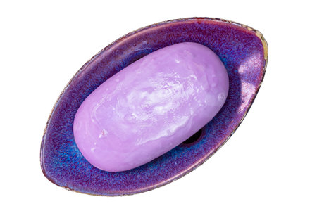 Top view of leaf shape purple ceramic soap bar, tray, dish, holder with fragrant purple soap isolated on white background with clipping path.の写真素材