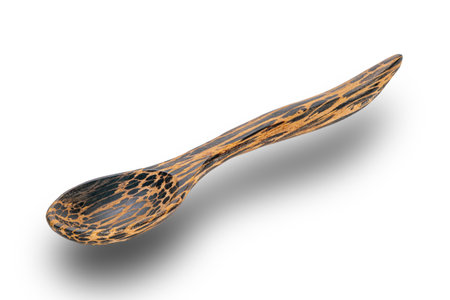 High angle view of wooden spoon isolated on white background with clipping path.の写真素材