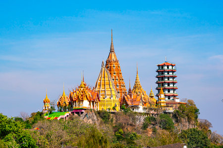 View of Wat Tham Sua, the beautiful buddhist temple on top of the mountain in Kanchanaburi, Thailand.の写真素材