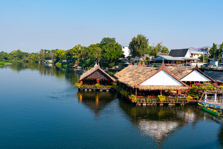 View of floating restaurant on the river kwai in Kanchanaburi province, Thailand in the morning in Chinese new year 2025.の写真素材