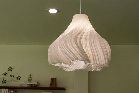 A modern glass pedant lamp in the living room in a house.の写真素材