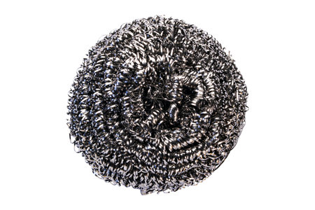 Top view of single stainless steel scrubber isolated on white background with clipping pathの写真素材