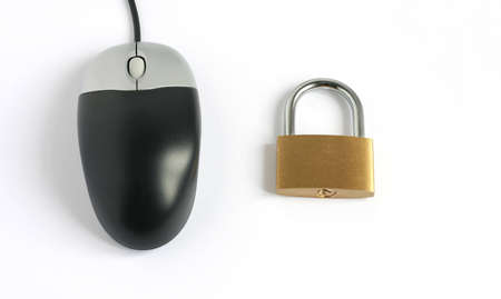 locked closed padlock with computer mouse isolated on white backgroundの写真素材