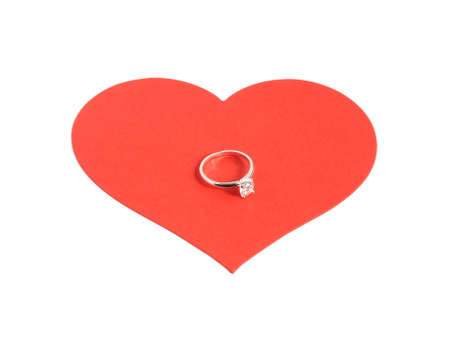 large red heart with diamond ring isolated on white backgroundの写真素材