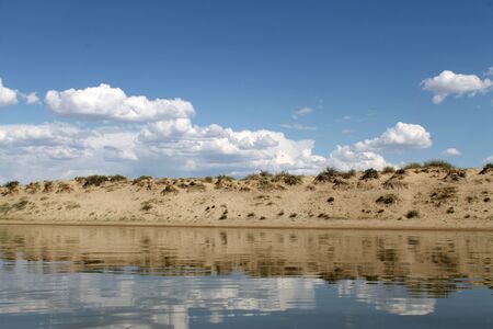the sky reflected in the water, deserted beach lake, summer sky, nature, blue cloud,